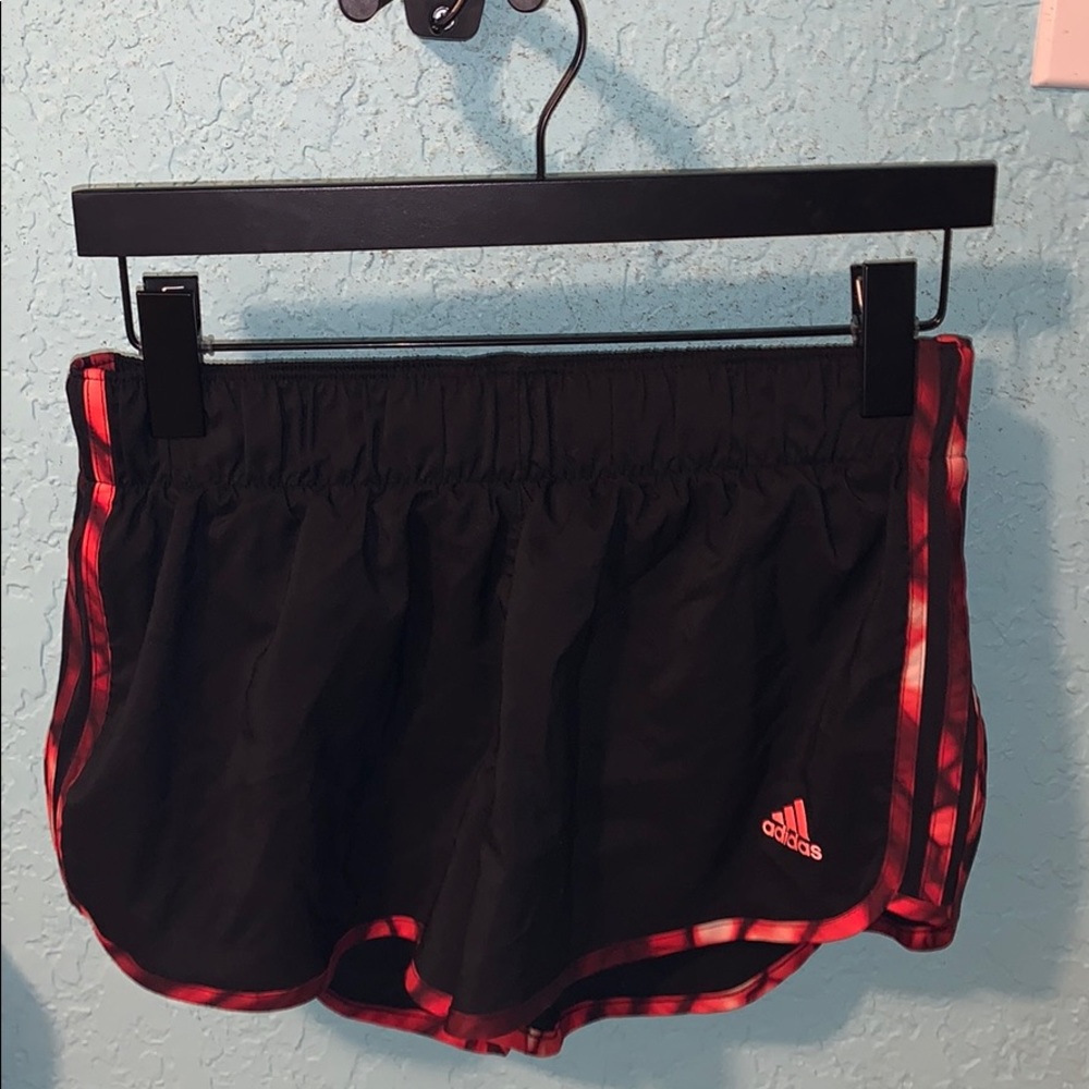 Black and red adidas shorts
